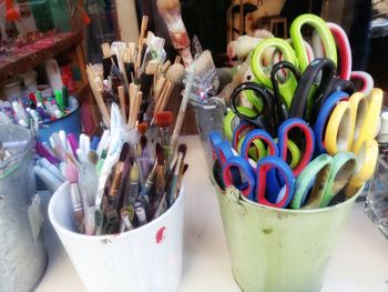 Close-up of multi colored pencils in container