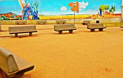 Lounge chairs on sand