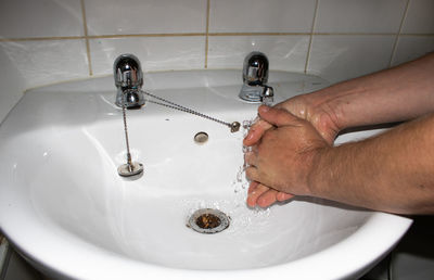 High angle view of woman in bathroom