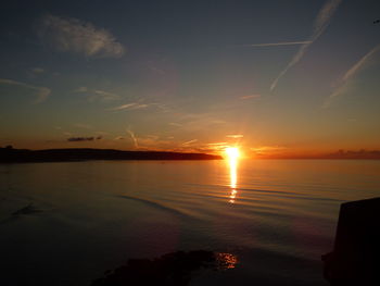 Scenic view of sunset over river