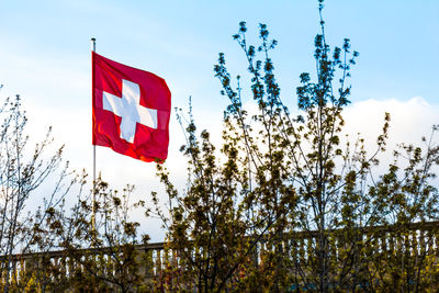 Low angle view of flag against sky