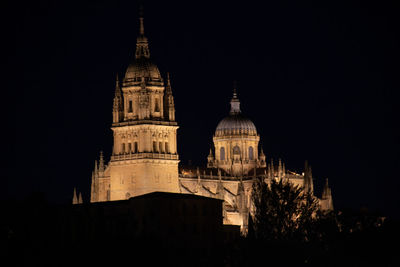 Low angle view of building against sky at night