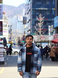 Low angle view of man standing in factory