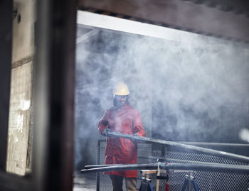 Craftsman wearing hard hat at work