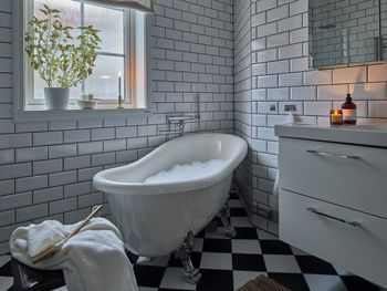 Free standing bathtub in bathroom