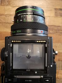 Close-up of camera on table