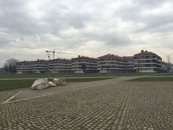 Built structure against cloudy sky