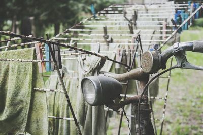 Close-up of abandoned laundry and bike