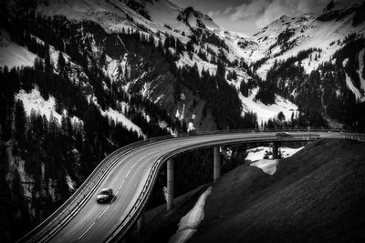 High angle view of bridge by alps during winter