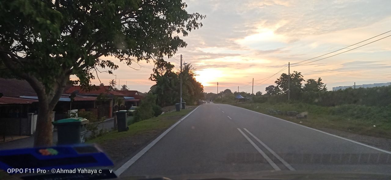 ROAD AGAINST SKY AT SUNSET