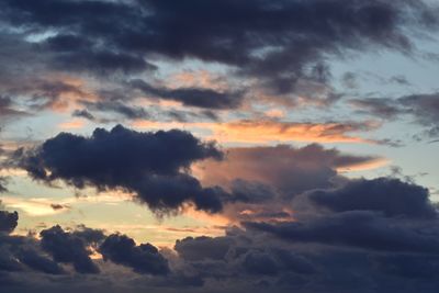 Low angle view of dramatic sky during sunset