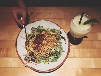 Midsection of food in bowl on table