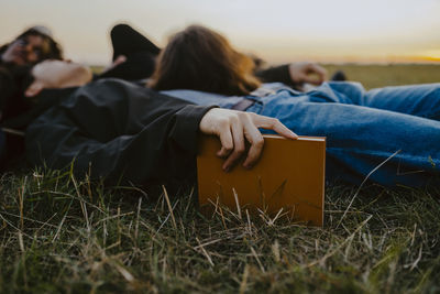 Women relaxing on field