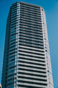 Low angle view of modern building against clear sky