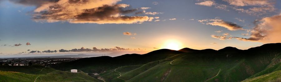 Panoramic view of landscape against sky during sunset