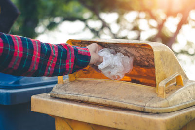 Close-up of hand holding ice cream