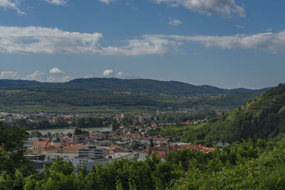 Scenic view of townscape against sky