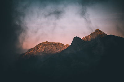 Scenic view of mountains against sky during sunset