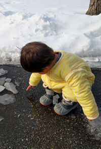 High angle view of boy in water