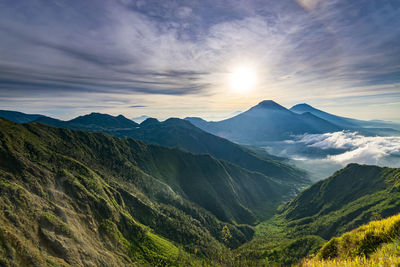 Scenic view of mountains against sky during sunset