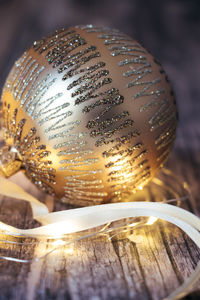 Close-up of glass container on table