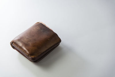 Close-up of rusty metal against white background