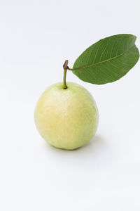 Close-up of apple against white background