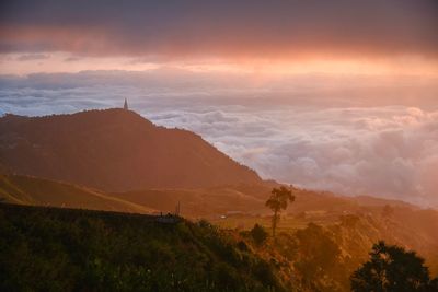 Scenic view of landscape against sky during sunset