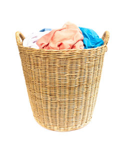 Close-up of wicker basket against white background