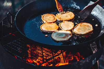 High angle view of breakfast on barbecue grill