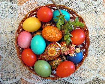 High angle view of easter eggs in basket on table