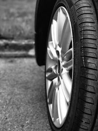 Close-up of vintage car on street