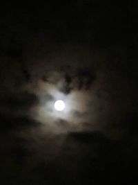 Low angle view of moon in sky at night