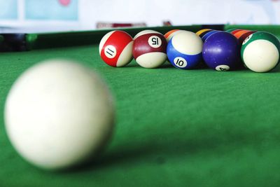 Close-up of multi colored ball on table
