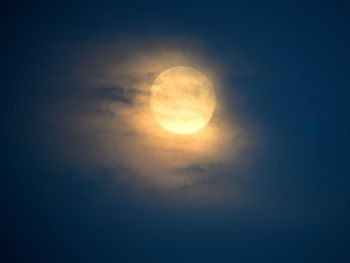Low angle view of moon against sky at night