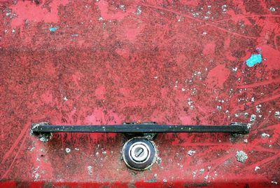 Close-up of handle on rusty metal