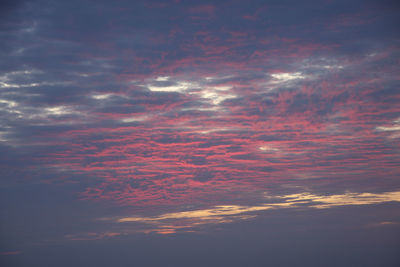 Low angle view of dramatic sky during sunset