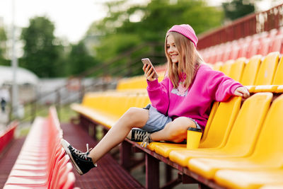 Young woman using mobile phone