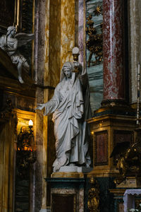 Statue in temple outside building