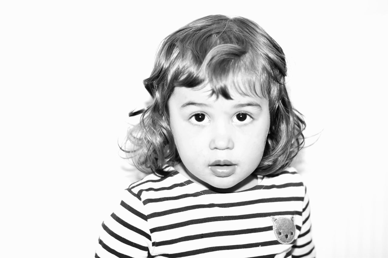 child, portrait, childhood, studio shot, striped, white background, one person, children only, headshot, people, making a face, human body part, close-up