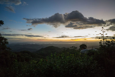 Scenic view of landscape against sky during sunset