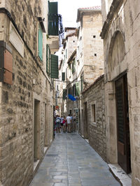 Narrow alley with buildings in background