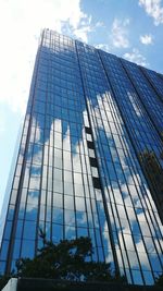 Low angle view of modern building against sky