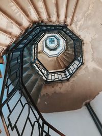 Directly below shot of spiral staircase in building