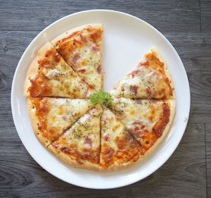 High angle view of pizza on table