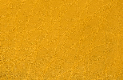 Full frame shot of cracked yellow orange surface