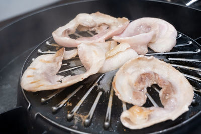 High angle view of meat in cooking pan