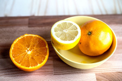 Close-up of oranges on table