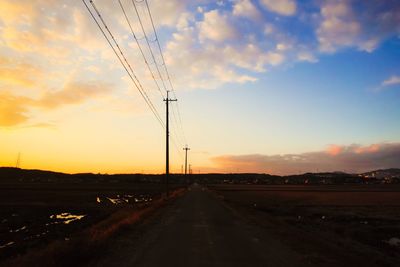 Road against sky during sunset