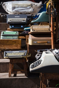 Stack of old objects on table